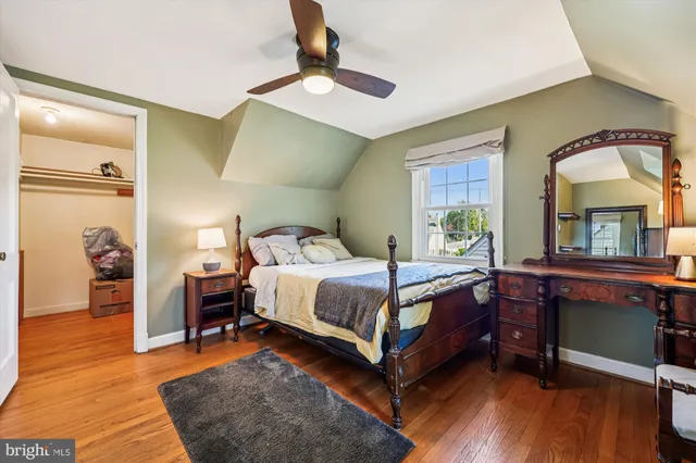 a view of an outdoor sitting area with furniture and umbrella