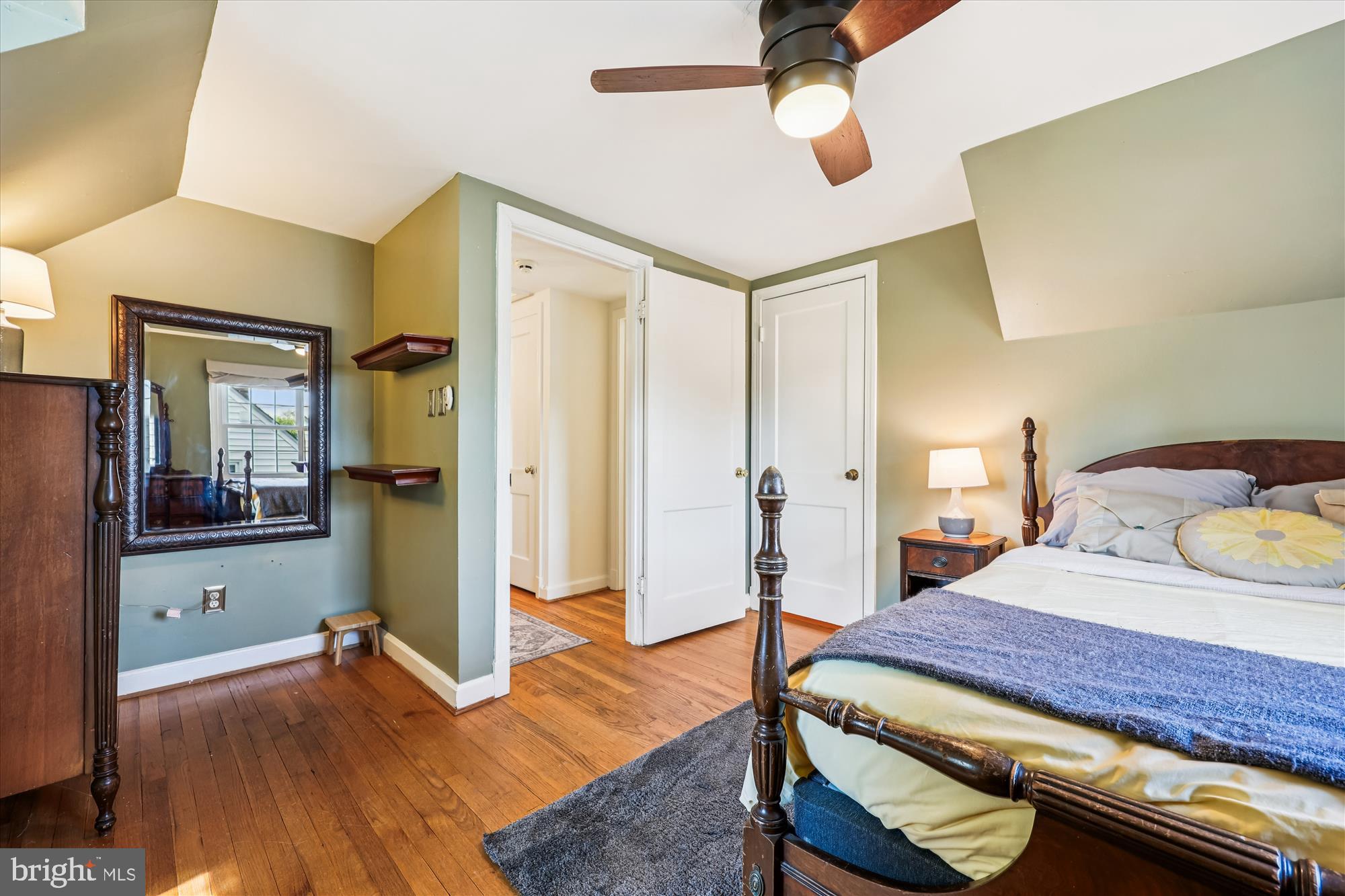 1605 Windham Lane Silver Spring, MD 20902 - Photo 45 of 65 a bedroom with a bed and a chandelier