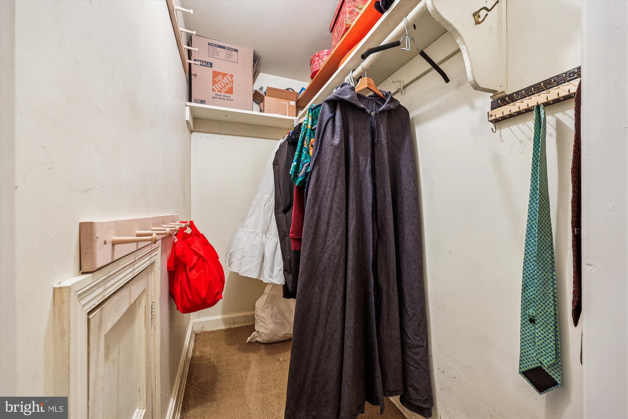1605 Windham Lane Silver Spring, MD 20902 - Photo 53 of 65 a view of walk in closet with clothes and shoes