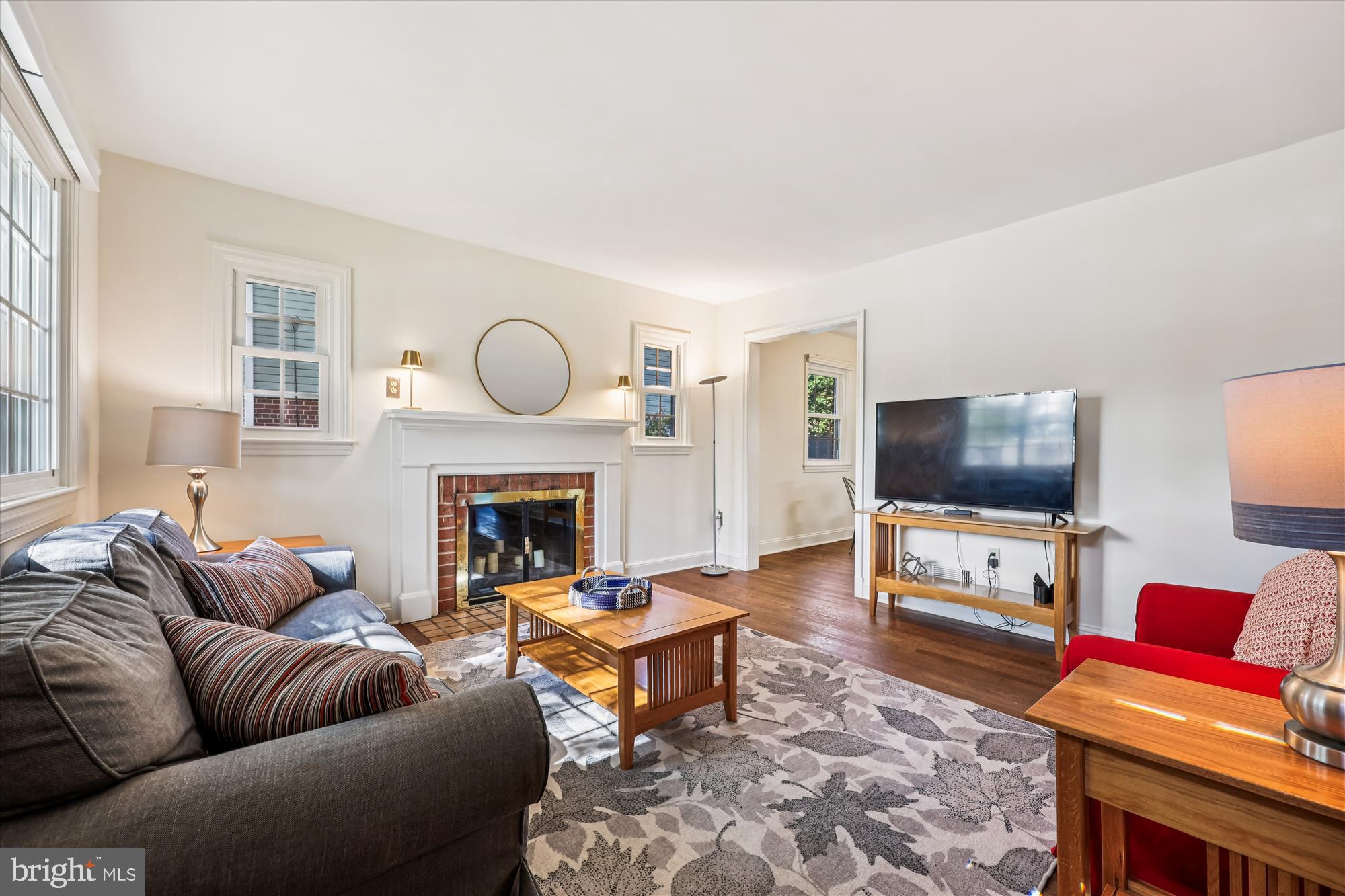 1605 Windham Lane Silver Spring, MD 20902 - Photo 6 of 65 a living room with furniture and a flat screen tv