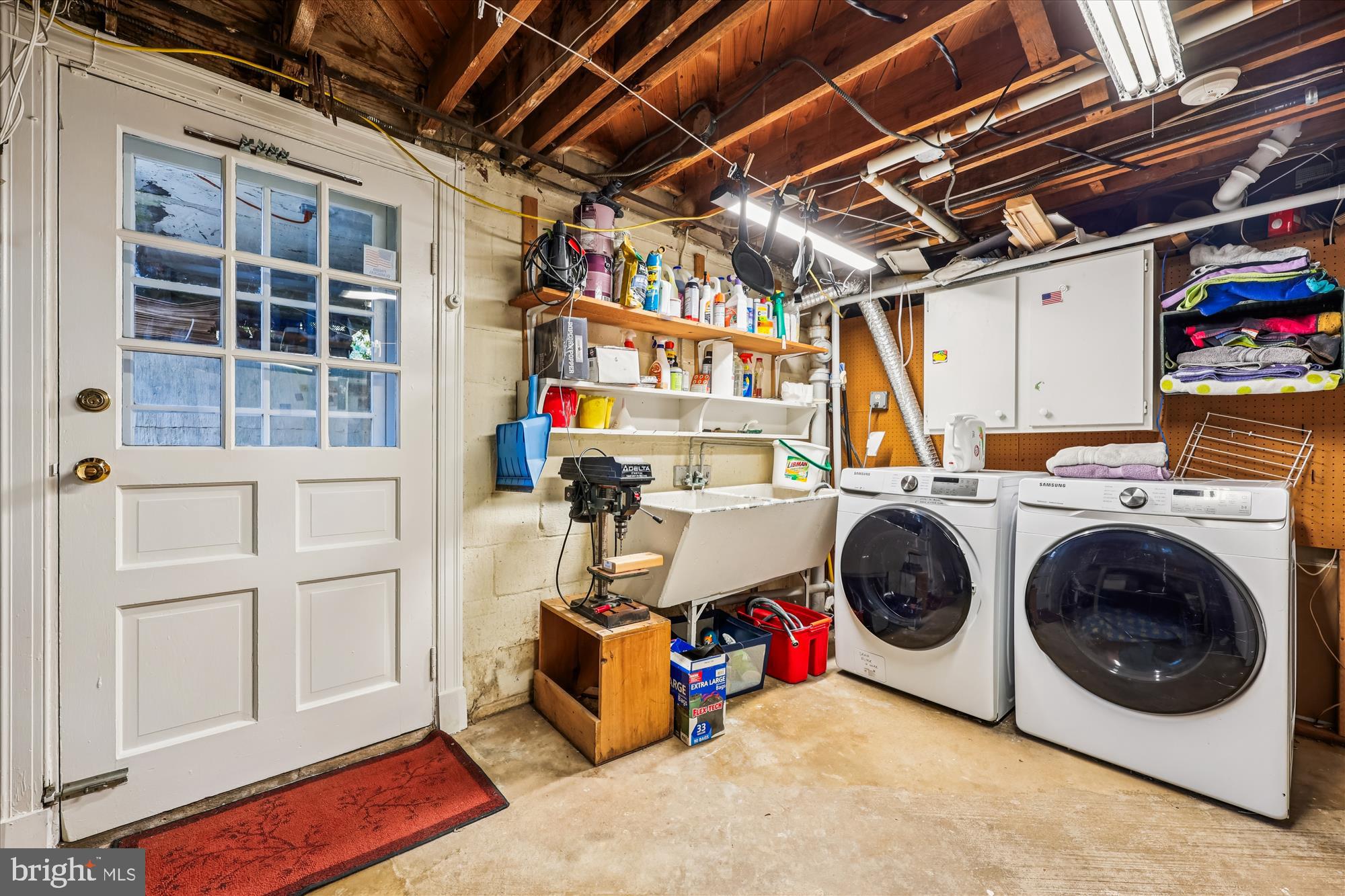 1605 Windham Lane Silver Spring, MD 20902 - Photo 62 of 65 a utility room with dryer and washer