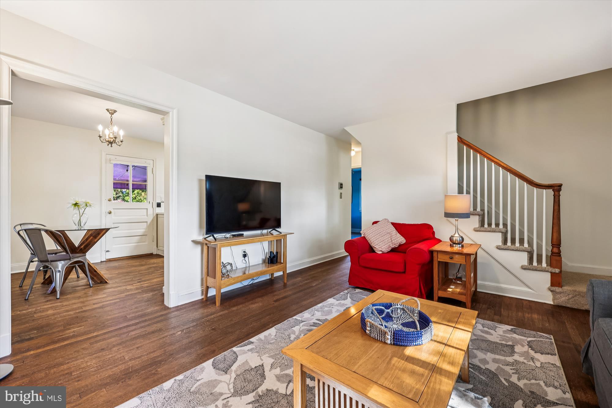 1605 Windham Lane Silver Spring, MD 20902 - Photo 10 of 65 a living room with furniture or wooden floor and a flat screen tv