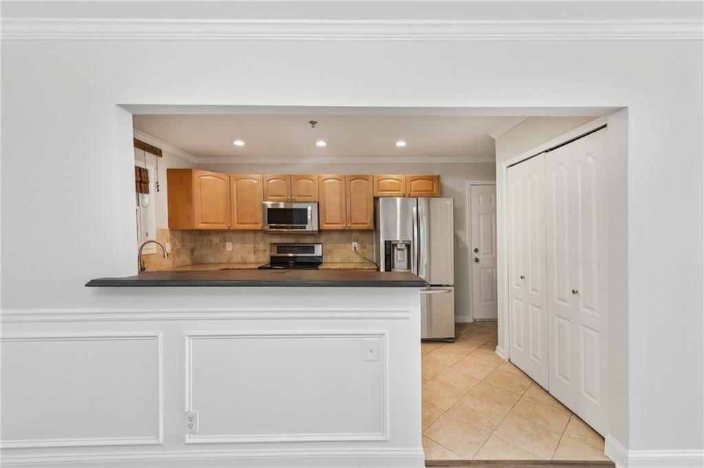 2825 Northeast Expressway, Unit F3 Atlanta, GA 30345 - Photo 13 of 45 a view of kitchen with stainless steel appliances cabinets