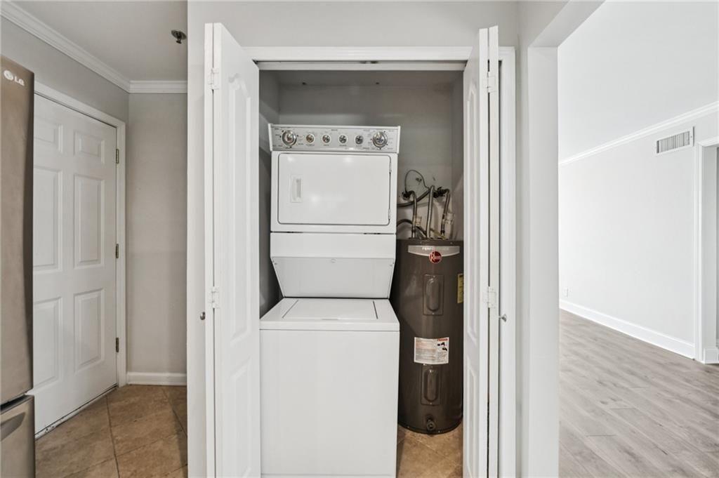 2825 Northeast Expressway, Unit F3 Atlanta, GA 30345 - Photo 21 of 45 a utility room with dryer and washer