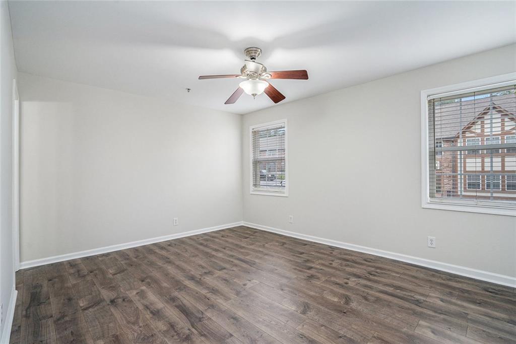 2825 Northeast Expressway, Unit F3 Atlanta, GA 30345 - Photo 25 of 45 wooden floor in an empty room with a window
