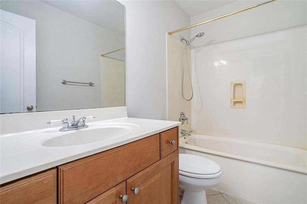 2825 Northeast Expressway, Unit F3 Atlanta, GA 30345 - Photo 27 of 45 a bathroom with a sink toilet vanity and shower