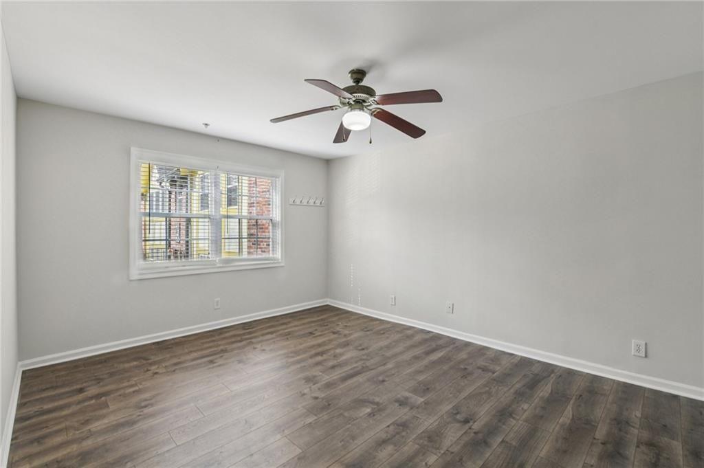 2825 Northeast Expressway, Unit F3 Atlanta, GA 30345 - Photo 35 of 45 wooden floor in an empty room with a window