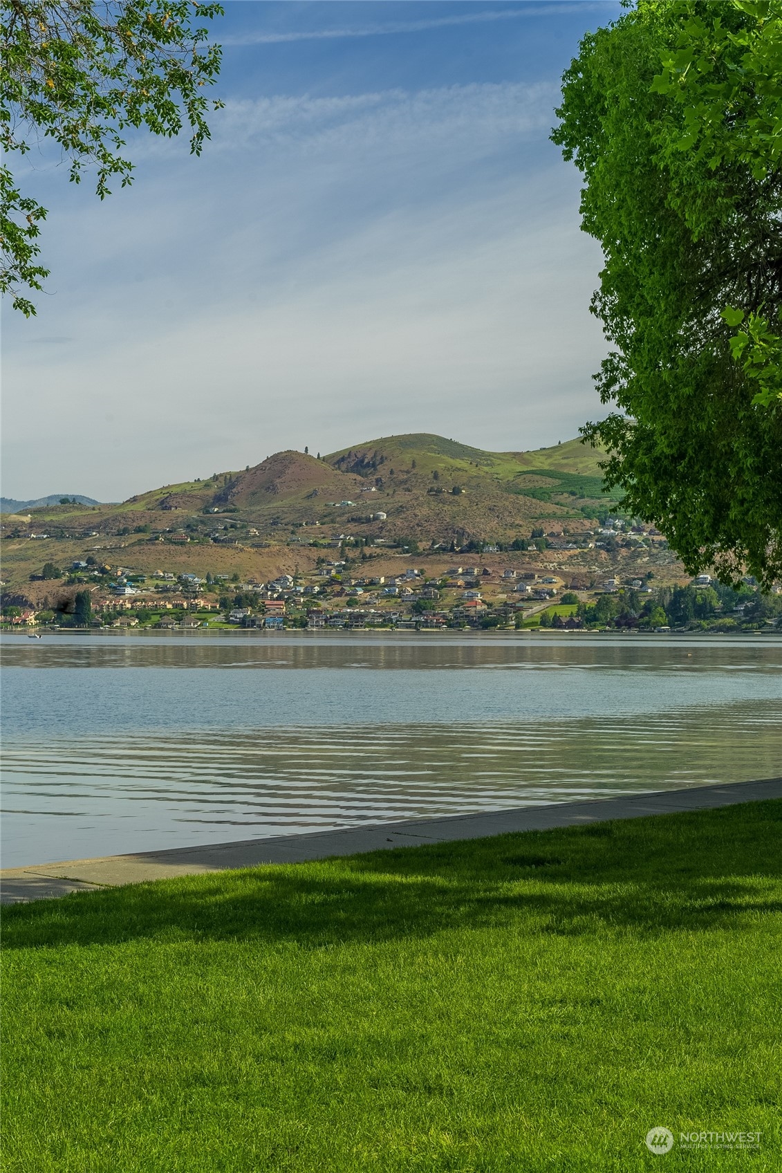 2216 West Prospect Street Chelan, WA 98816 - Photo 25 of 26 a view of a lake with a mountain in the background