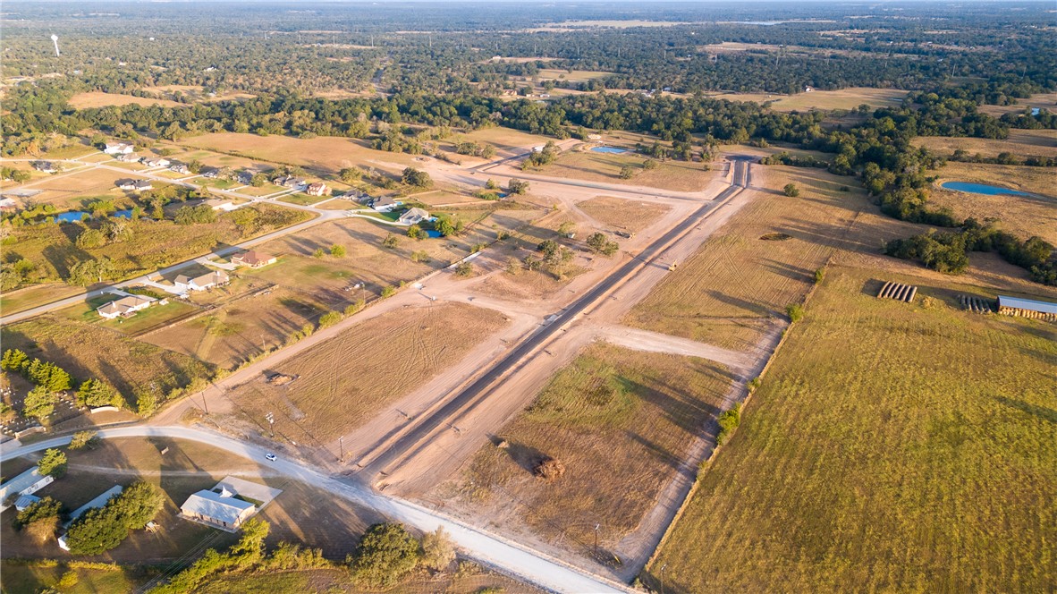 9917 Panther Creek Road Iola, TX 77861 - Photo 15 of 50 an aerial view of residential houses with outdoor space