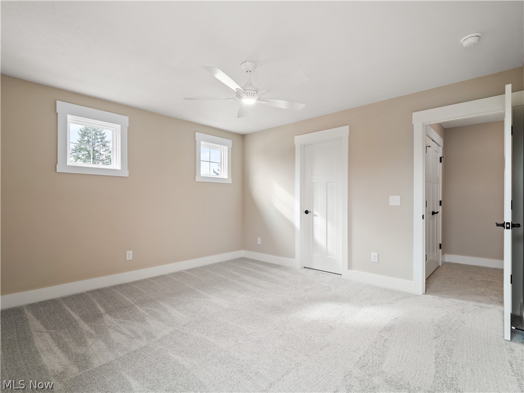 34270 Brookside Lane North Ridgeville, OH 44039 - Photo 37 of 50 Unfurnished bedroom featuring light carpet and a ceiling fan