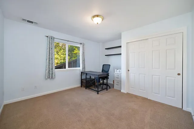a view of a garage with storage