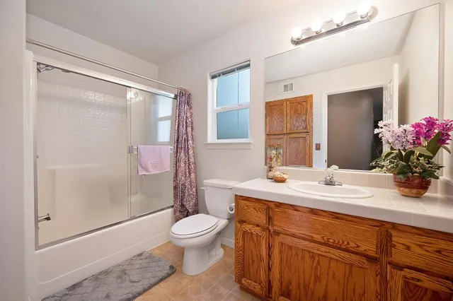 a view of a patio on the roof deck