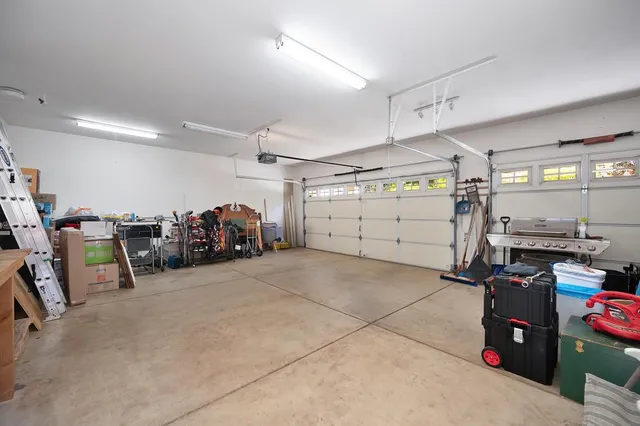 a view of a balcony with chairs