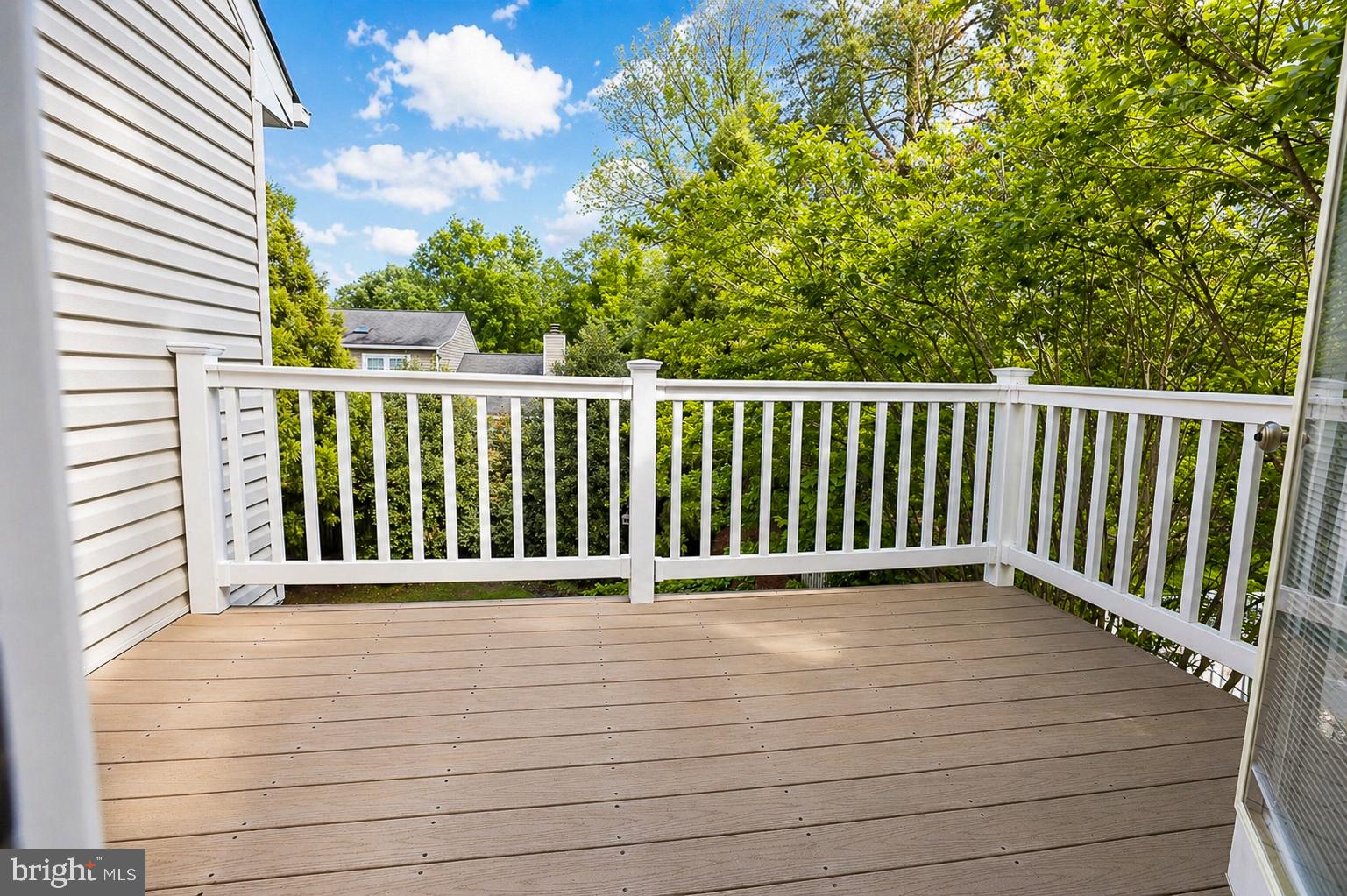 8021 Clark Station Road Severn, MD 21144 - Photo 15 of 35 Serene balcony with lush views.