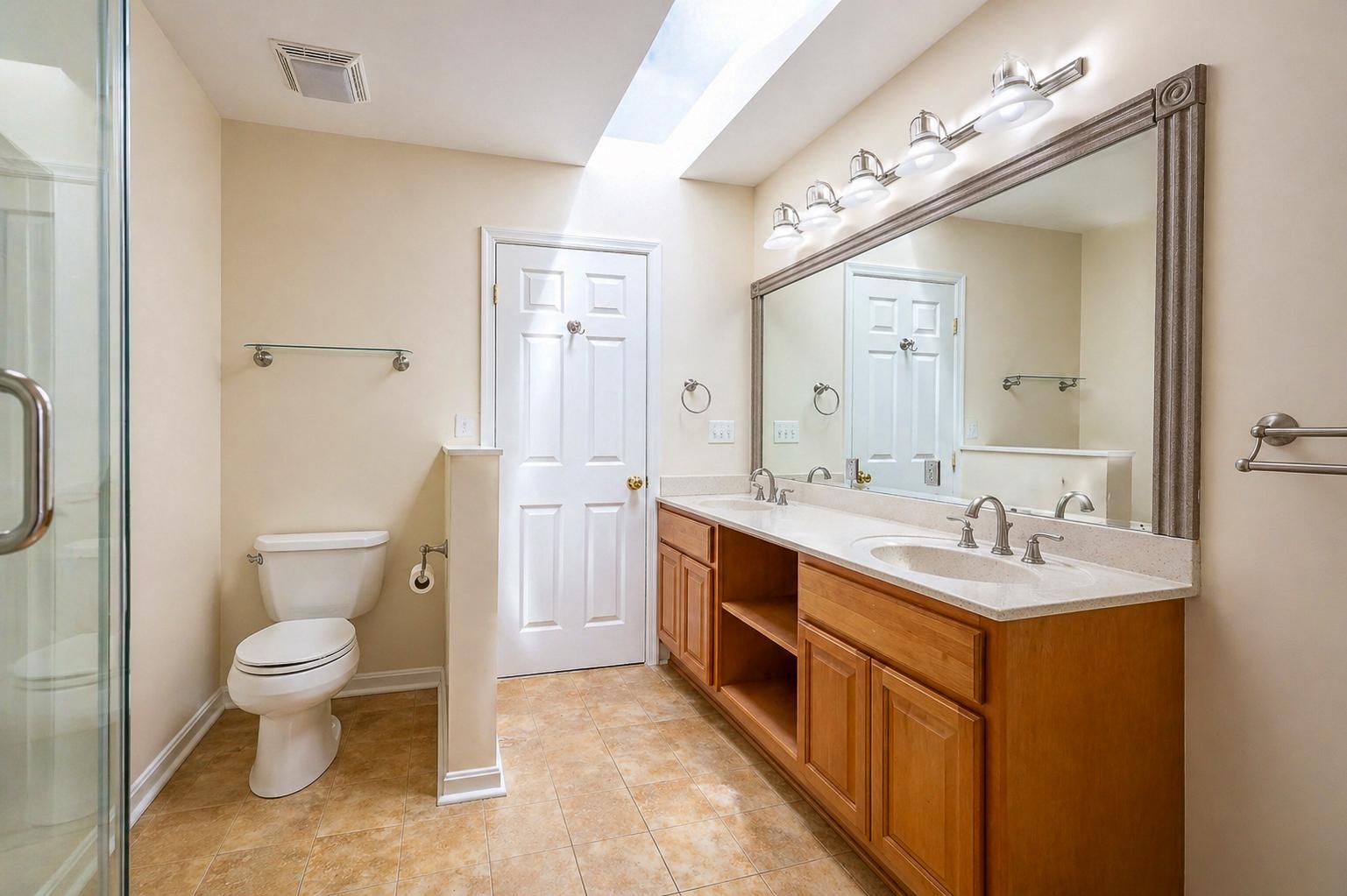 8021 Clark Station Road Severn, MD 21144 - Photo 17 of 35 Spacious primary bathroom with natural light