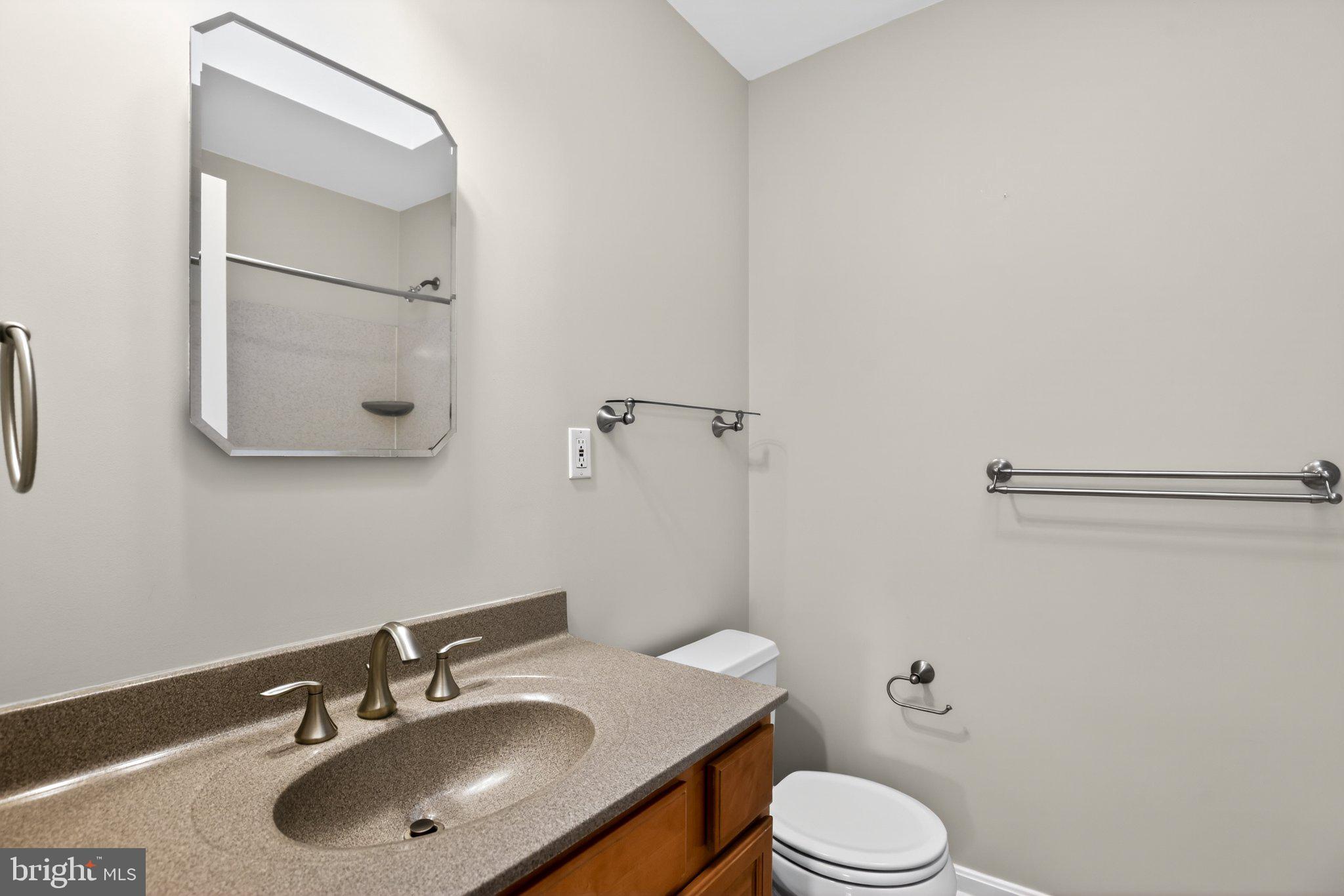 8021 Clark Station Road Severn, MD 21144 - Photo 22 of 35 Modern bathroom with sleek finishes.