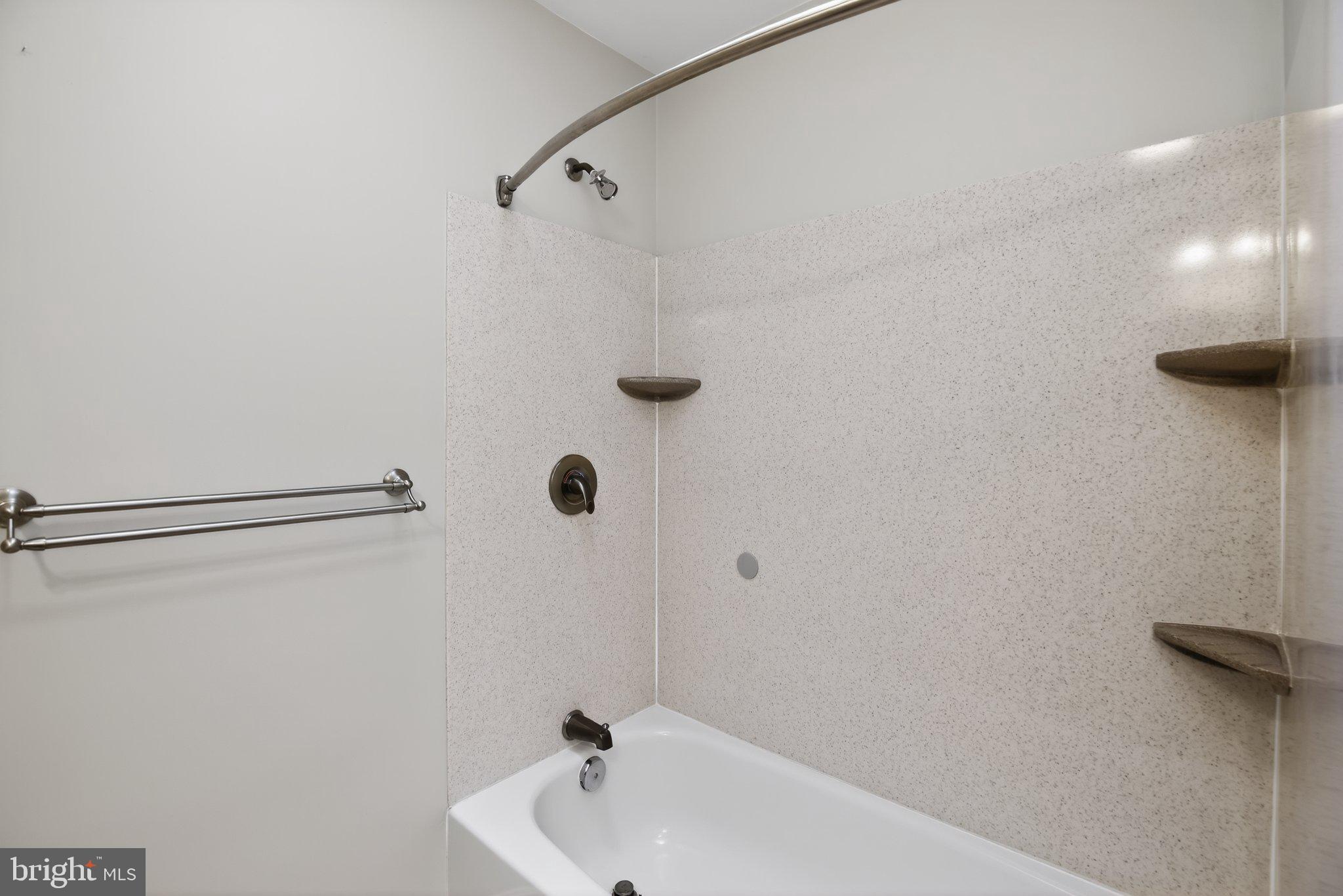 8021 Clark Station Road Severn, MD 21144 - Photo 23 of 35 Modern bath with sleek finishes.