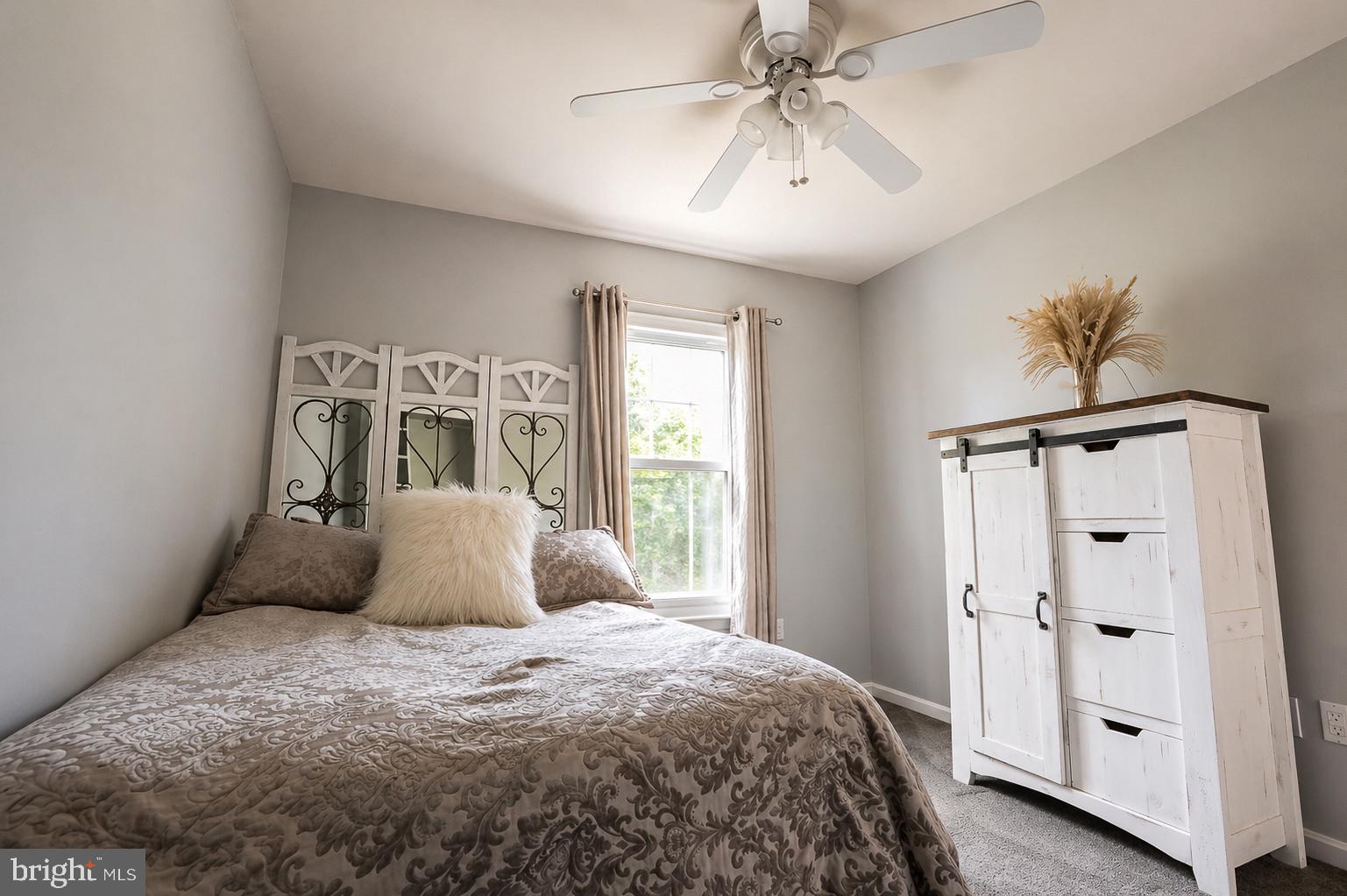 8021 Clark Station Road Severn, MD 21144 - Photo 24 of 35 Serene bedroom with natural light.