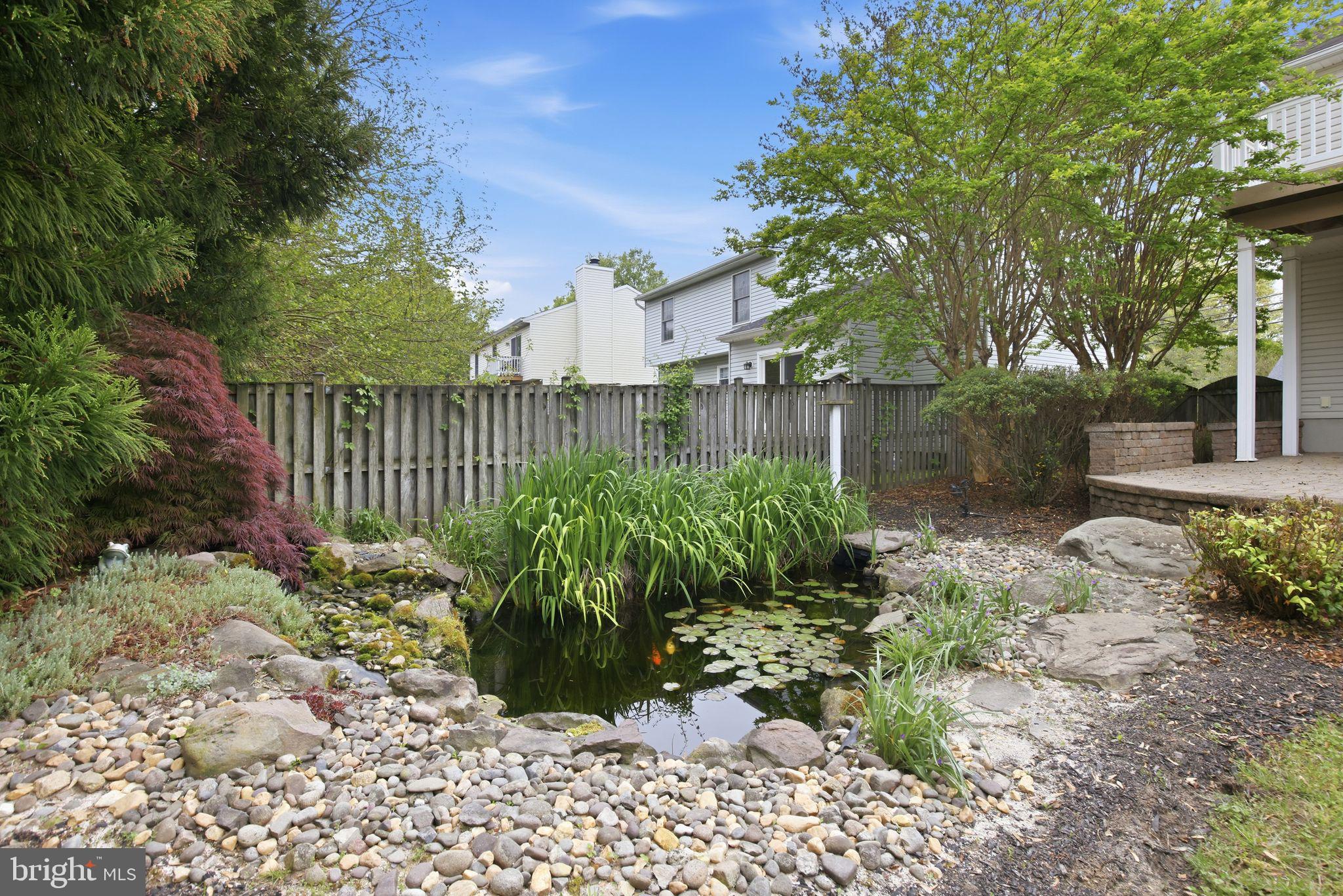 8021 Clark Station Road Severn, MD 21144 - Photo 33 of 35 Tranquil garden pond oasis.