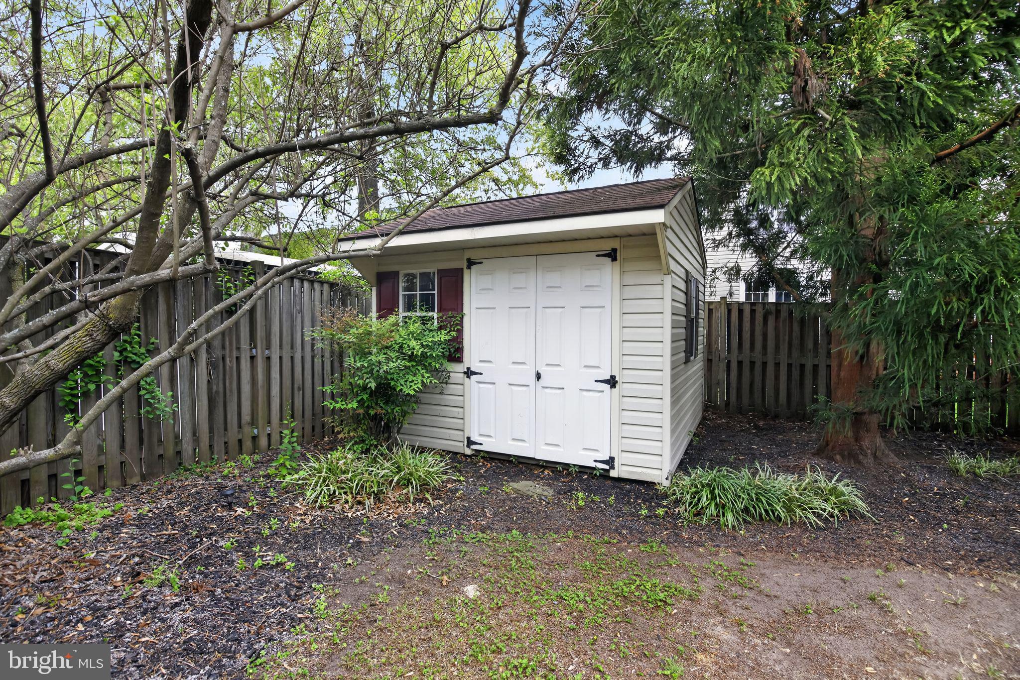 8021 Clark Station Road Severn, MD 21144 - Photo 35 of 35 Charming garden shed in serene setting.