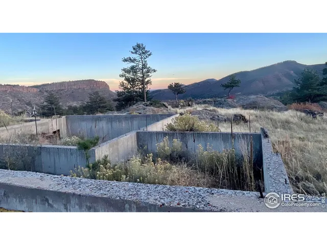 a view of an ocean and mountain