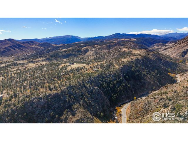 a black and white photo of a mountain