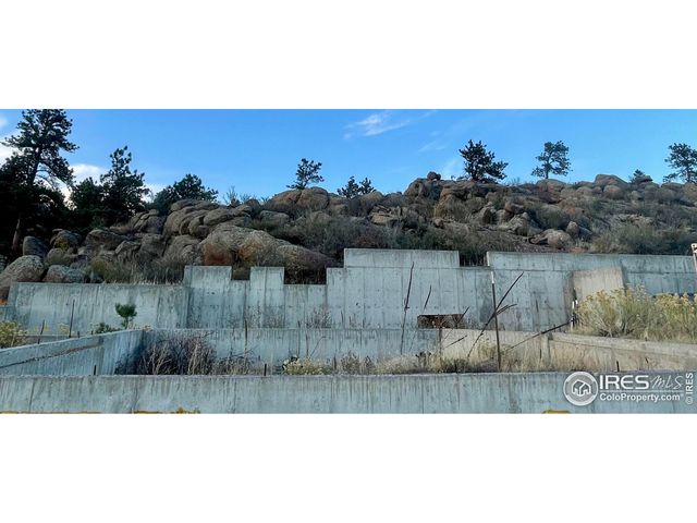 a view of a lake with a mountain in the back