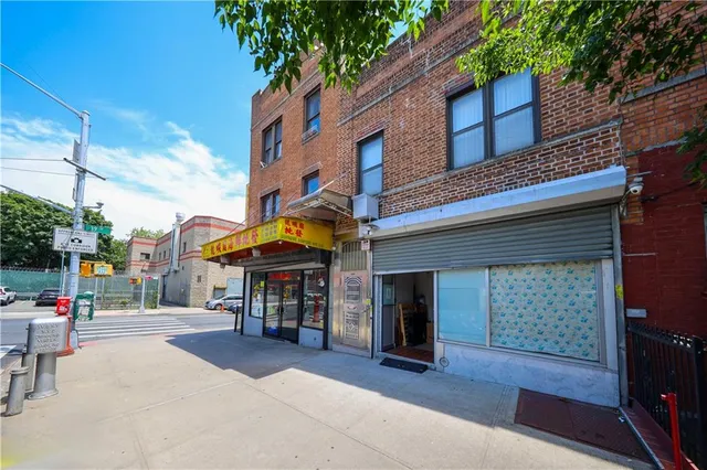 a view of a building with sitting area