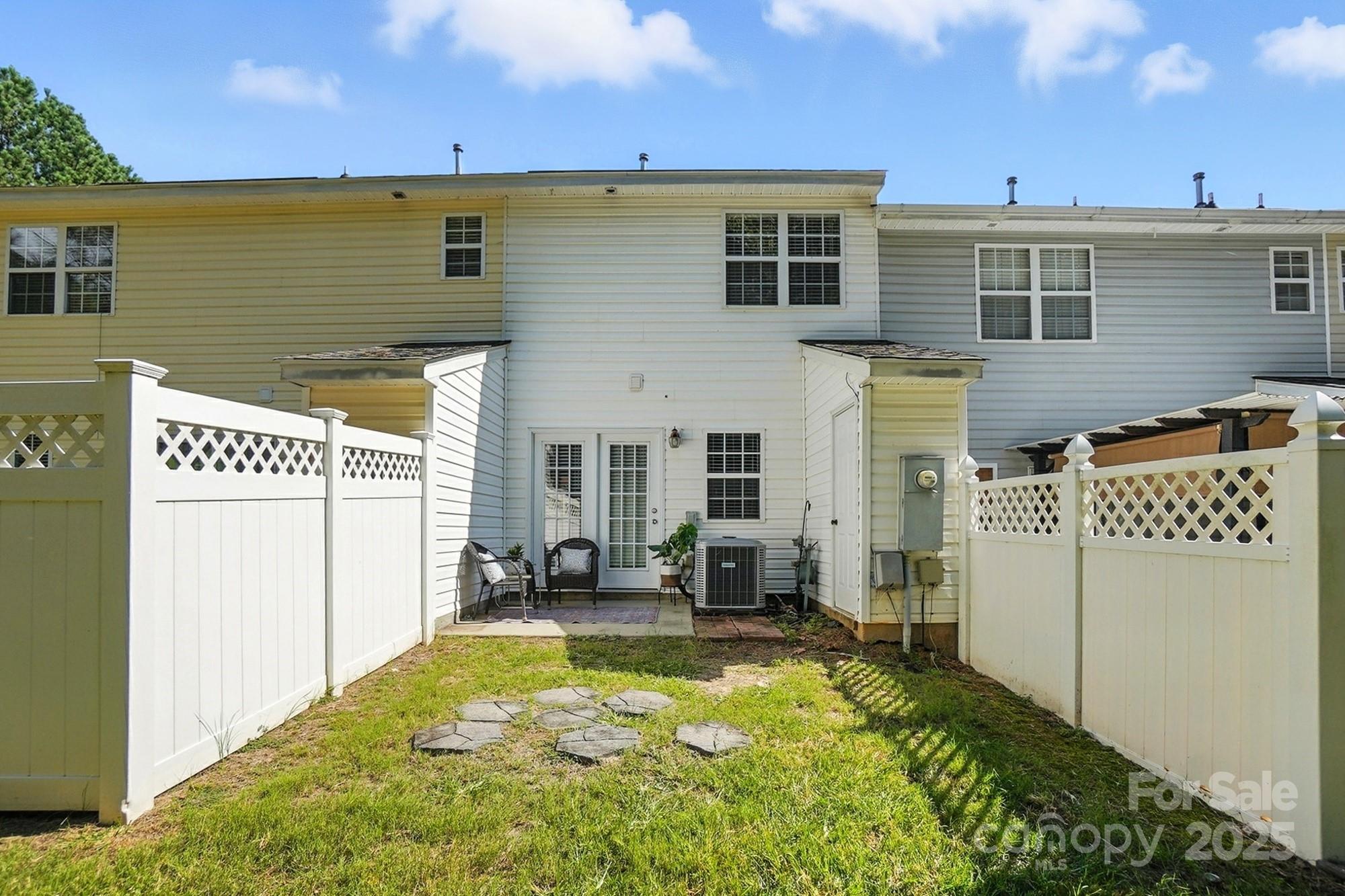 8130 Rudolph Road Charlotte, NC 28216 - Photo 20 of 36 a view of a house with backyard
