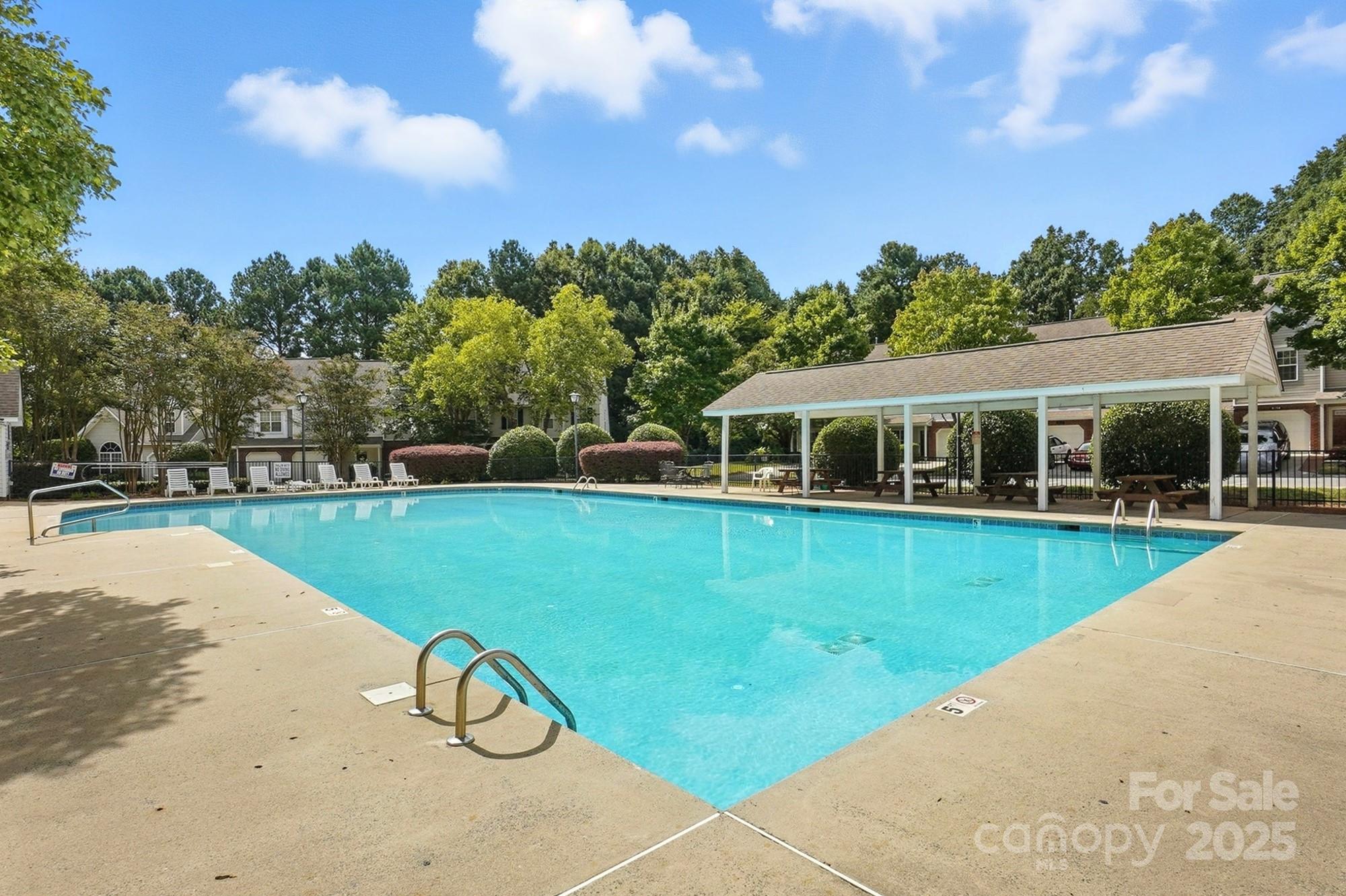 8130 Rudolph Road Charlotte, NC 28216 - Photo 25 of 36 a front view of house with yard and entertaining space