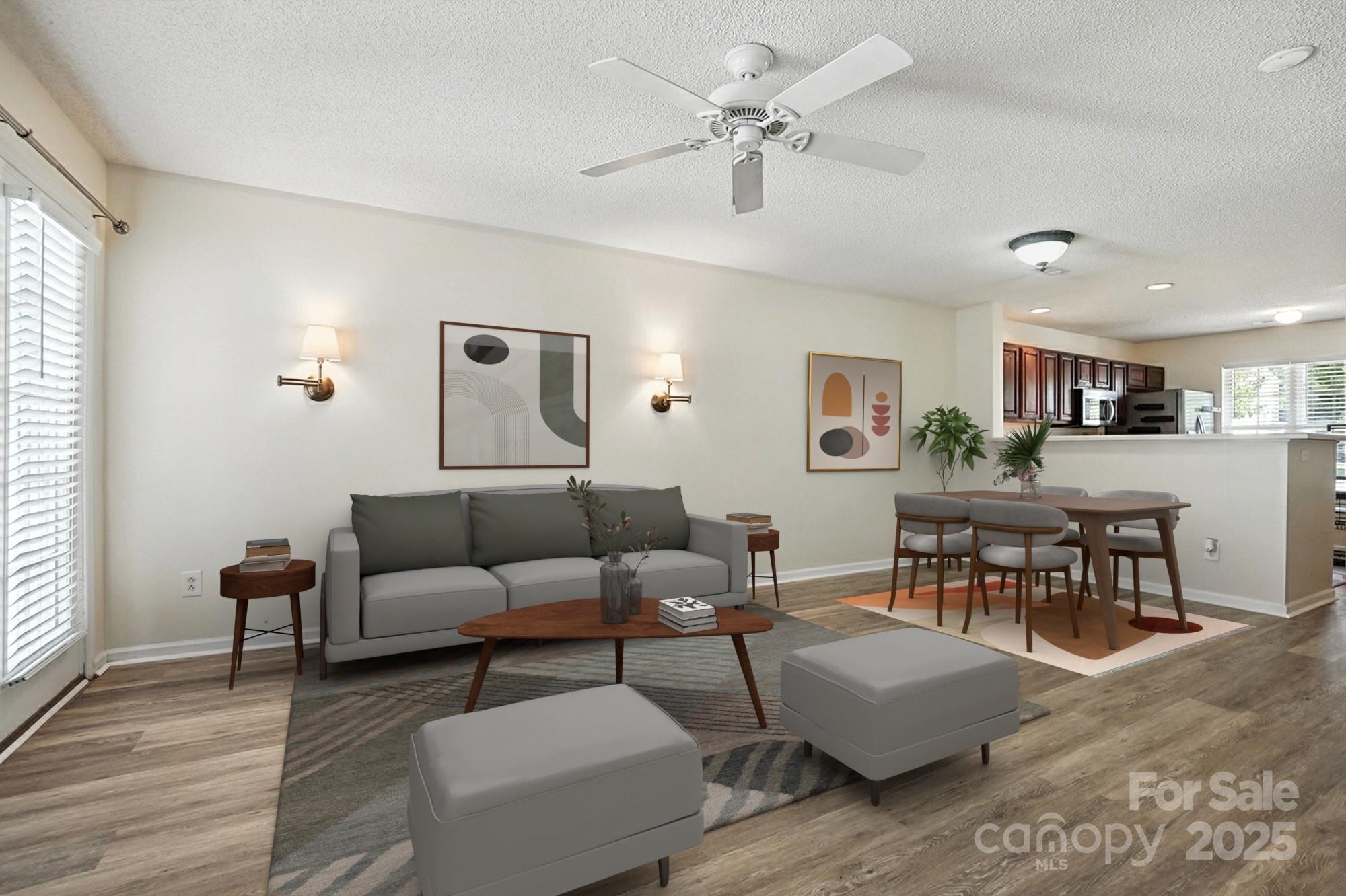 8130 Rudolph Road Charlotte, NC 28216 - Photo 5 of 36 a living room with furniture and view of kitchen
