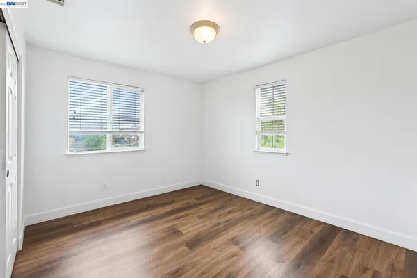 a spacious bathroom with a bathtub and a shower