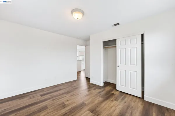 a bathroom with a sink a mirror and a shower