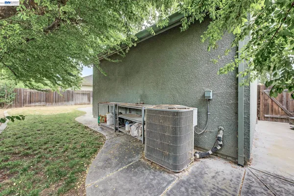 an aerial view of residential houses with city view