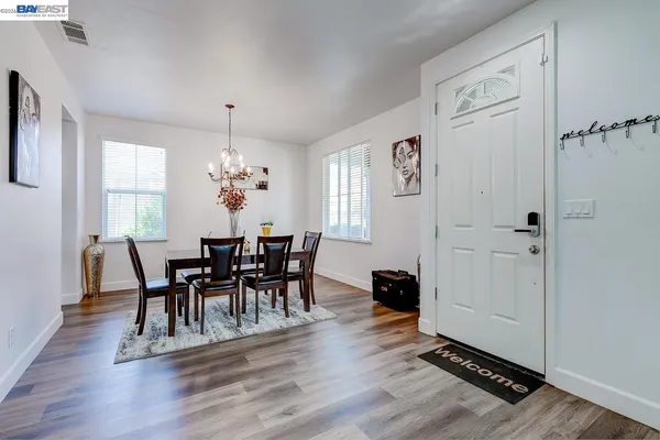 a bathroom with a sink toilet and a mirror