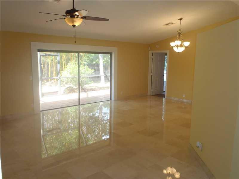 7589 Texas Trail Boca Raton, FL 33487 - Photo 5 of 13 a view of an empty room with a window