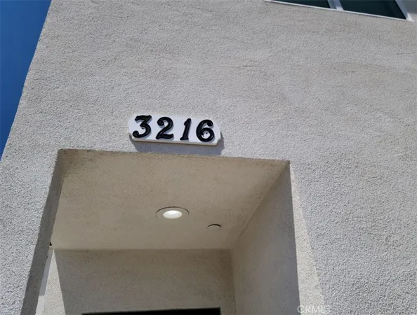 a view of a house with a street
