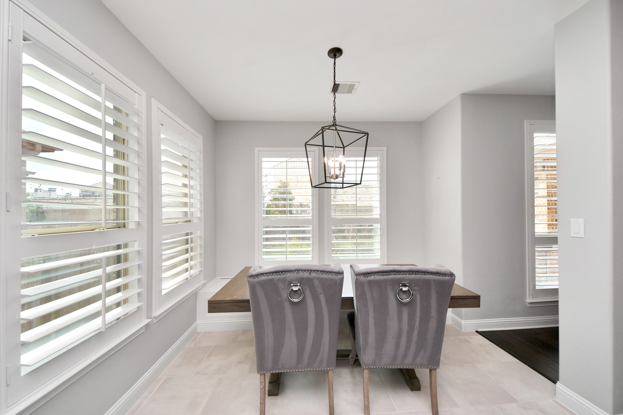 2811 Hadley Springs Lane Spring, TX 77386 - Photo 13 of 50 a dining room with furniture a chandelier and wooden floor