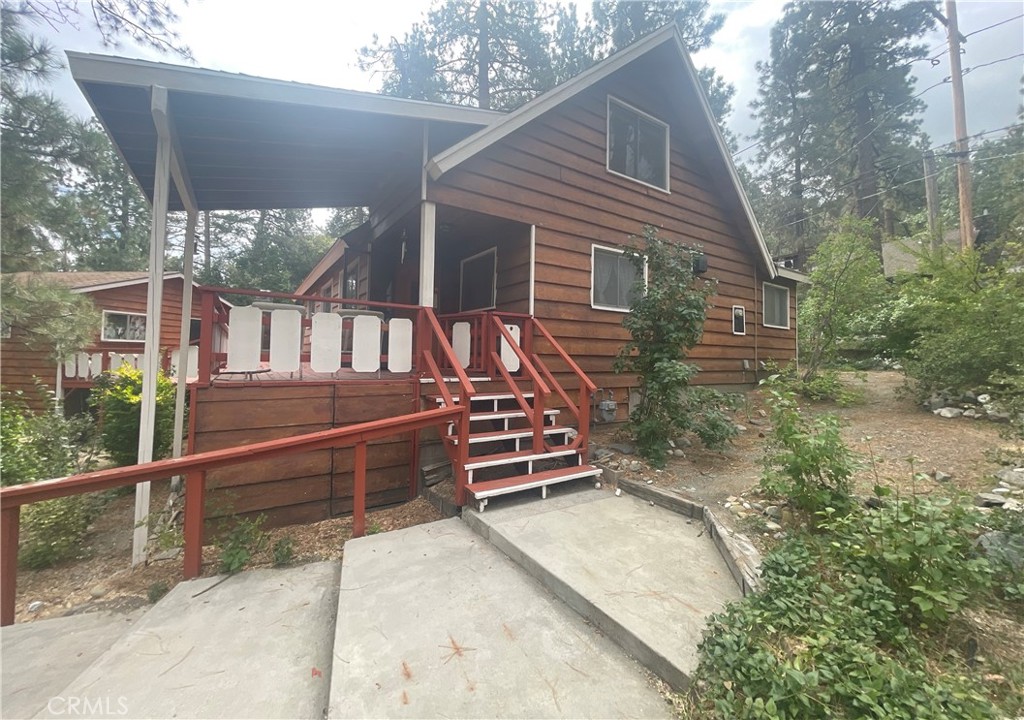 1057 Eagle Road Wrightwood, CA 92397 - Photo 4 of 10 a front view of a house with a balcony