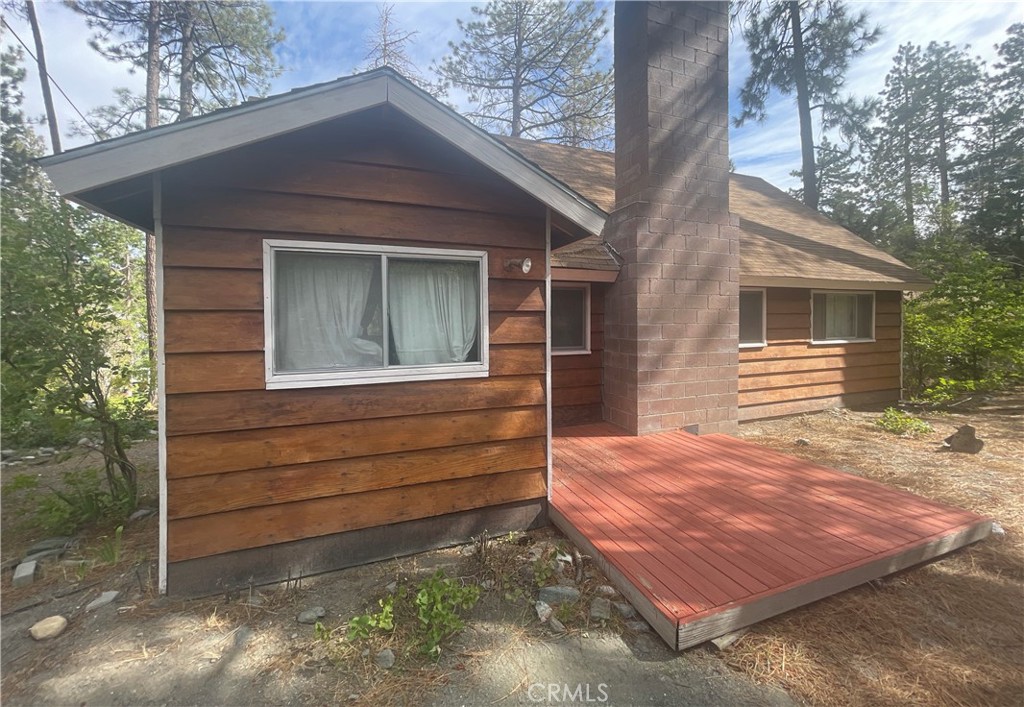1057 Eagle Road Wrightwood, CA 92397 - Photo 7 of 10 a front view of a house with a yard