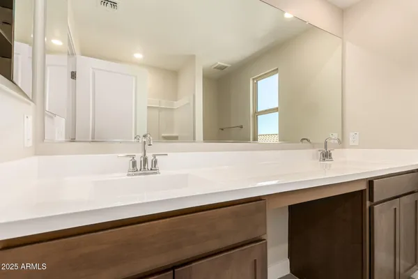 a bathroom with a bathtub and a toilet