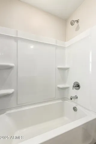 a view of a hallway with closet