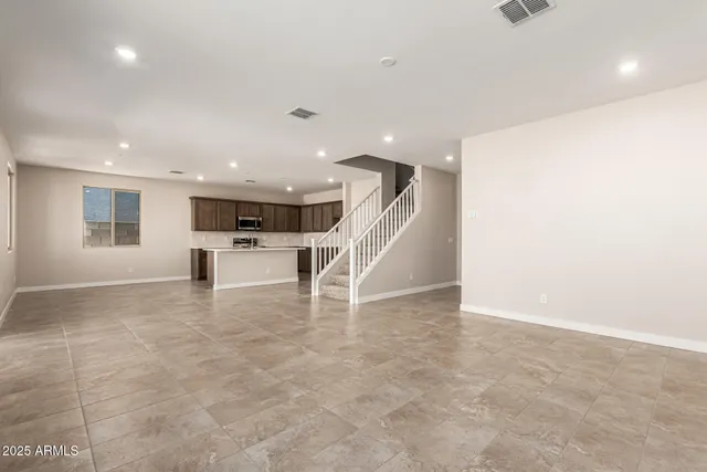 a view of a livingroom with a staircase