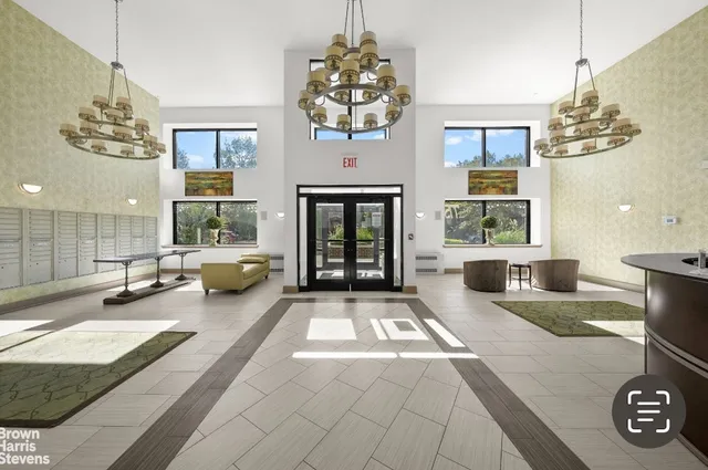 a front view of a building with garden