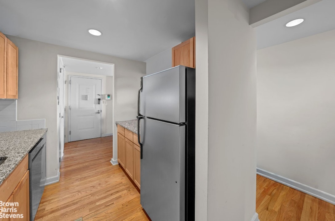 775 Lafayette Avenue, Unit 8B Brooklyn, NY 11221 - Photo 8 of 27 a kitchen with a refrigerator and a sink