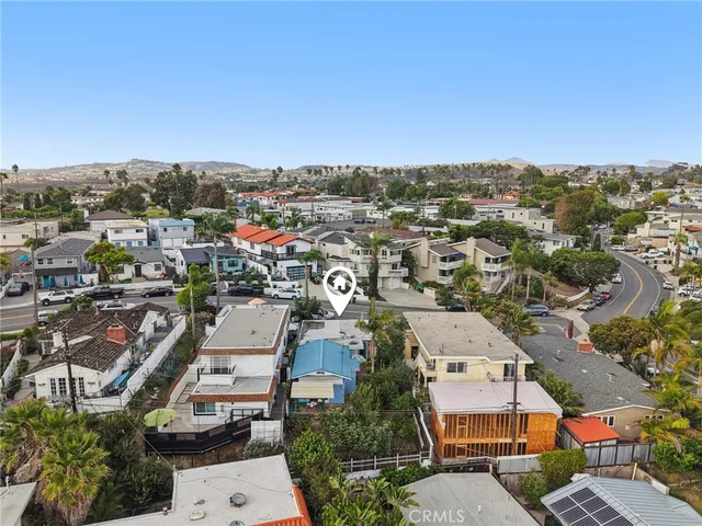 a view of a potted plants on a table and chair