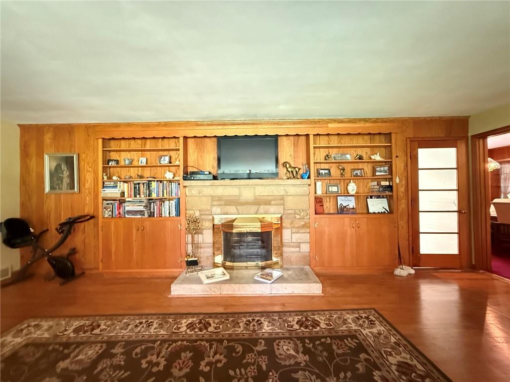 397 Hadley Road Greenville, PA 16125 - Photo 22 of 37 built in bookcases and fireplace