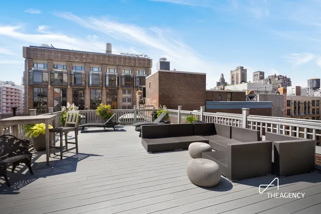 a view of living room and patio kitchen