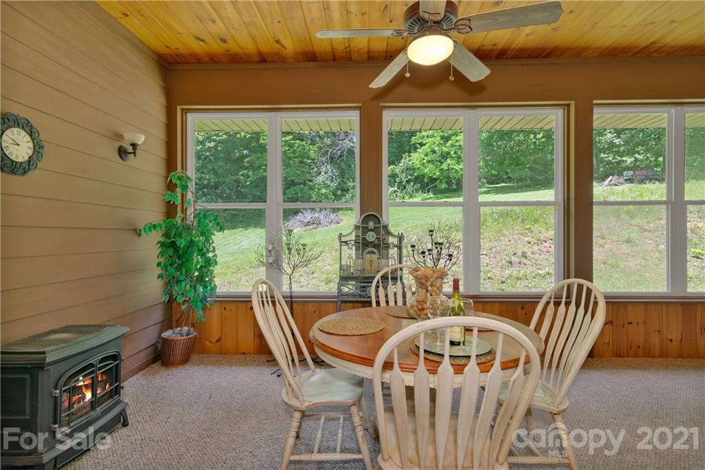 253 Benitez Way Clyde, NC 28721 - Photo 24 of 40 a view of a dining room with furniture window and outside view