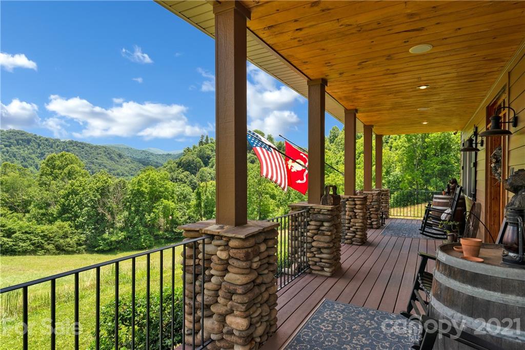 253 Benitez Way Clyde, NC 28721 - Photo 4 of 40 a view of balcony with wooden floor